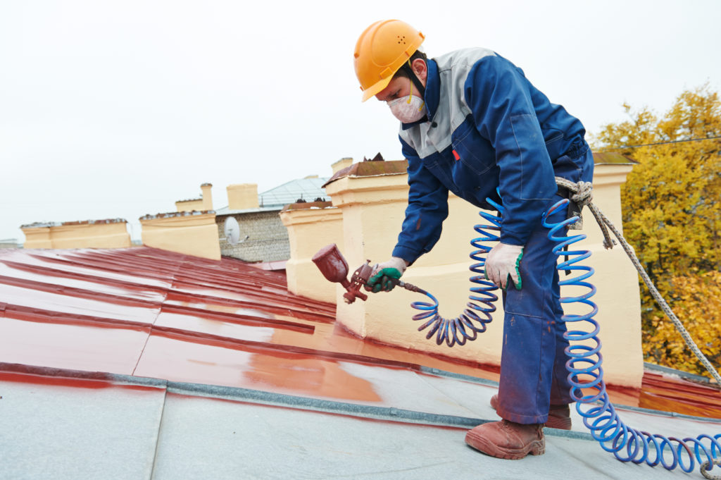 https://www.rpsmetalroofing.com/wp-content/uploads/2020/12/roofer-repainting-metal-roof-1024x681.jpg