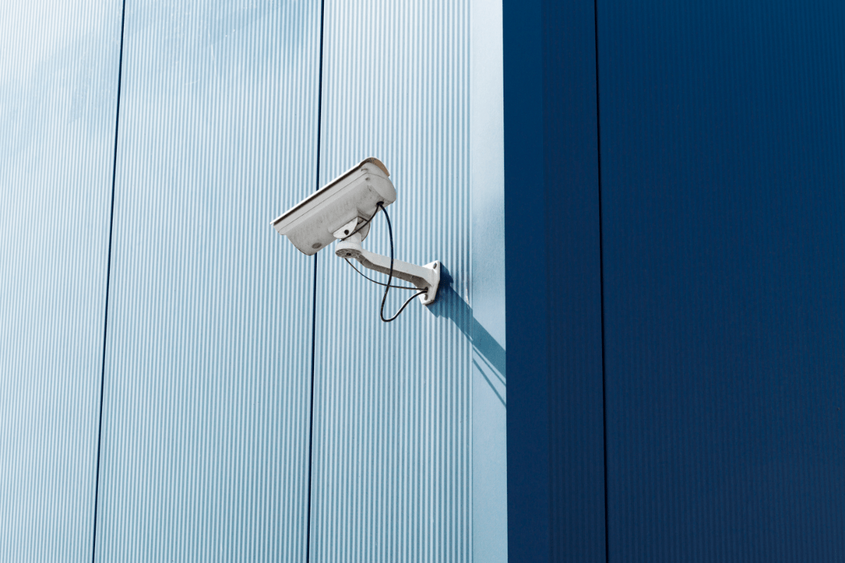 https://www.rpsmetalroofing.com/wp-content/uploads/2022/03/security-camera-blue-metal-siding.png