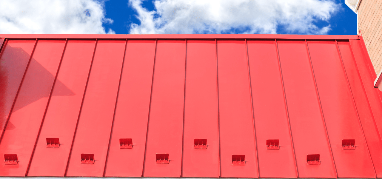 https://www.rpsmetalroofing.com/wp-content/uploads/2022/08/pitched-metal-roof-red-1280x600.png