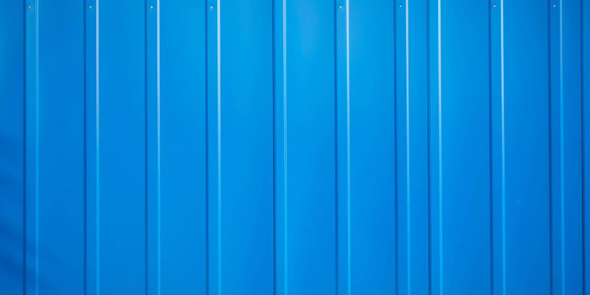 https://www.rpsmetalroofing.com/wp-content/uploads/2023/07/blue-metal-siding.png